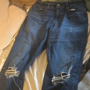 Women's Distressed Blue Jeans